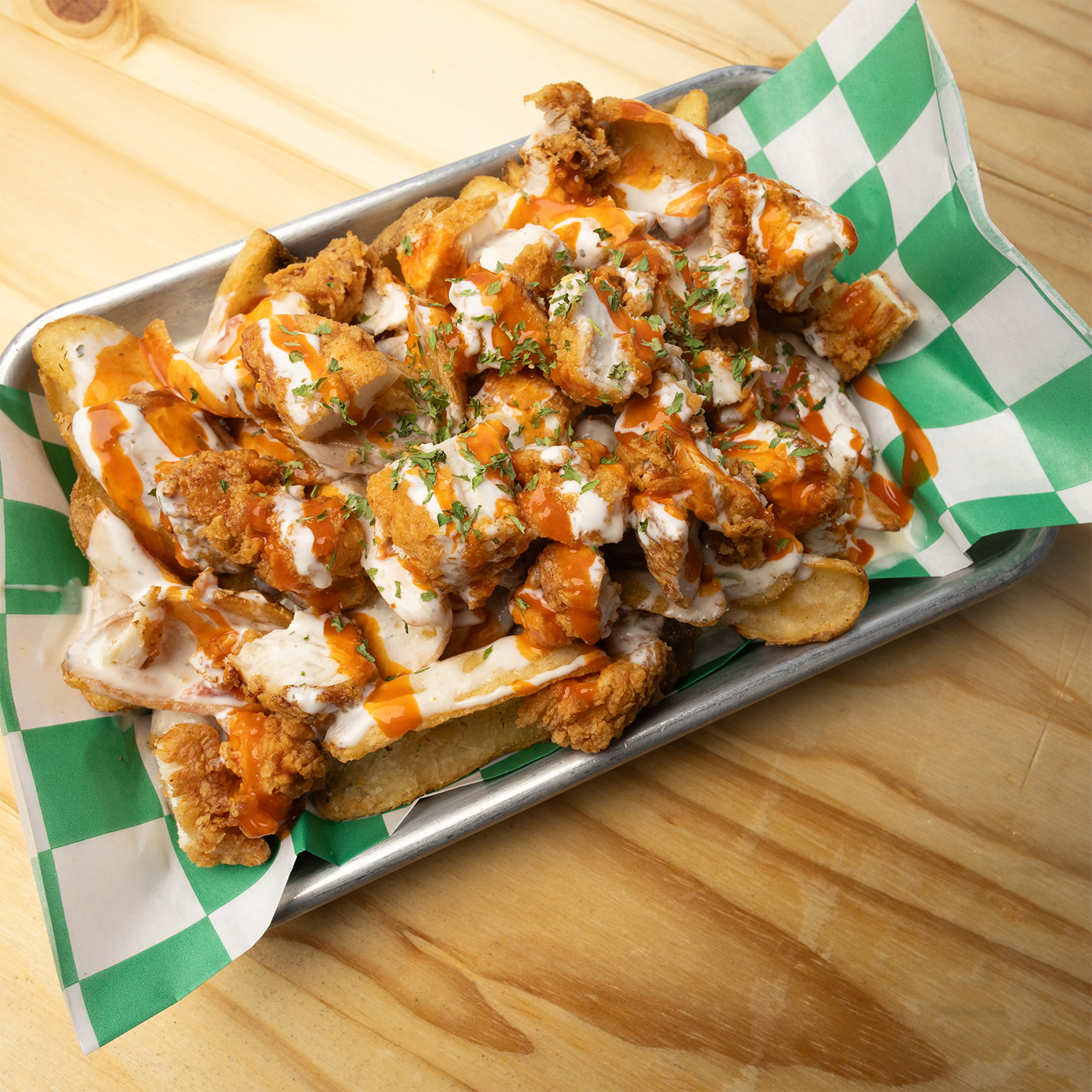 Buffalo chicken queso fries