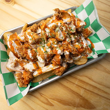 Buffalo chicken queso fries